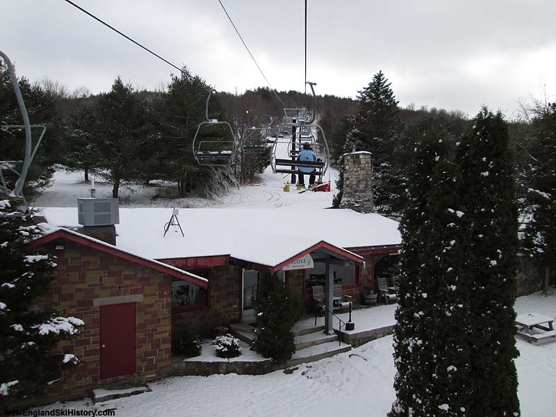 The Deer Run Triple passing over the original Pine Lodge (2014)