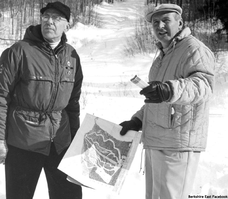 Thunder Mountain President Arthur Parker showing Minnie Dole (left) plans for the 1961-62 development