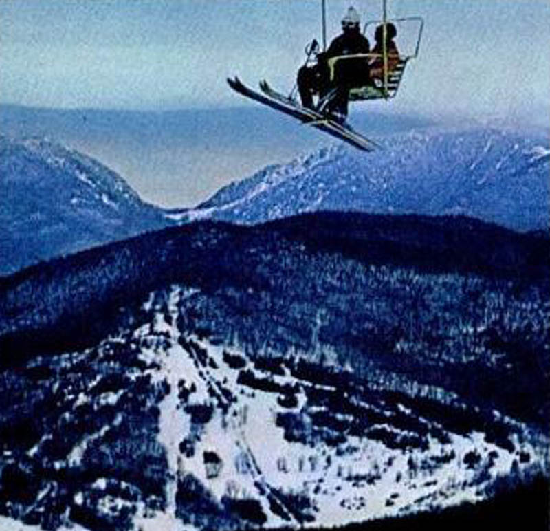 The double chairlift in 1969 or 1970 with Black Mountain in the background