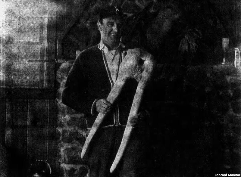 Russell McLaughlin showing off a walrus tusk in the 1960s