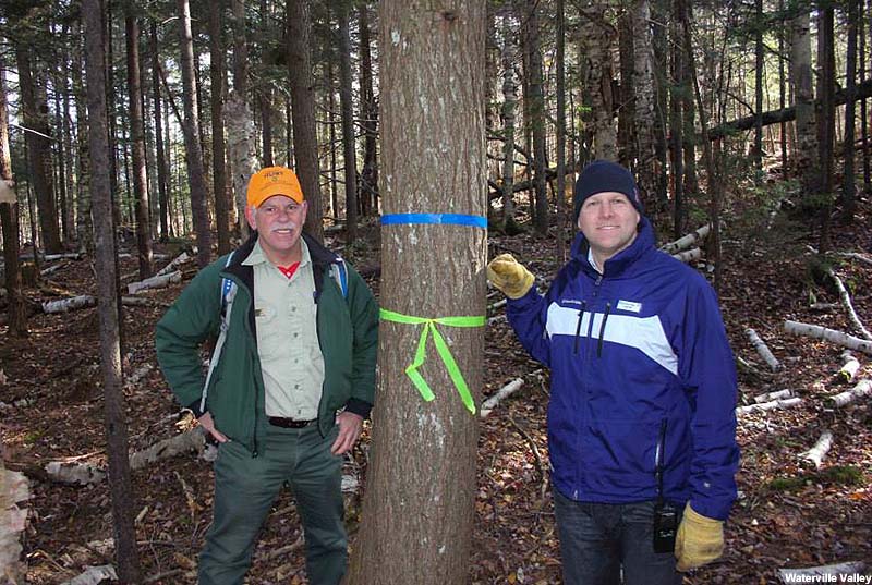 General Manager & CEO Chris Sununu (right) surveying Green Peak in fall 2013